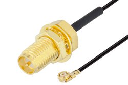  Reverse Polarity SMA Female Bulkhead to UMCX 2.1 Plug Cable Using 0.81mm Coax, RoHS