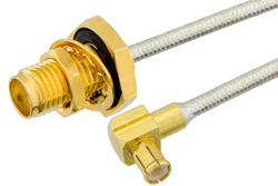 PE39421 - SMA Female Bulkhead to MCX Plug Right Angle Semi-Flexible Precision Cable Using PE-SR405FL Coax, RoHS