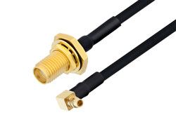 PE39436/HS - MMCX Plug Right Angle to SMA Female Bulkhead Cable Using PE-SR405FLJ Coax with HeatShrink