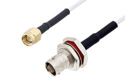 PE3W02140/HS - SMA Male to BNC Female Bulkhead Cable Using RG188 Coax with HeatShrink