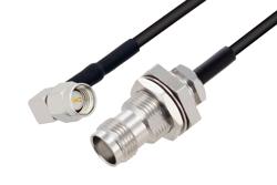 PE3W05509/HS - SMA Male Right Angle to TNC Female Bulkhead Low Loss Cable Using LMR-100 Coax with HeatShrink