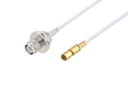 PE3W10615LF - Reverse Polarity TNC Jack Bulkhead to SSMC Plug Cable Using RG188 Coax, LF Solder