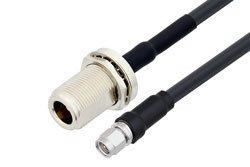 PE3W12991/HS - SMA Male to N Female Bulkhead Low Loss Cable Using LMR-240-DB Coax with HeatShrink