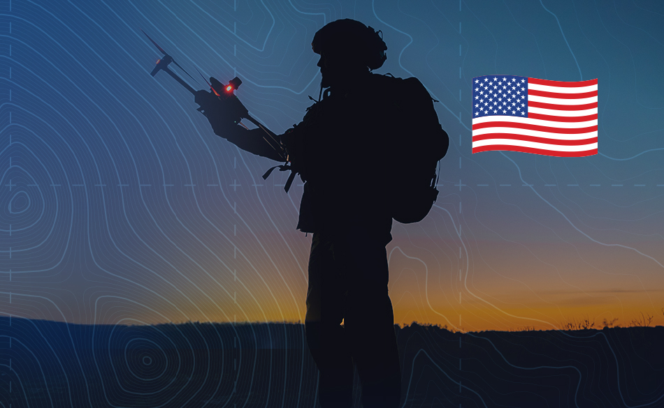 Soldier operating a drone at sunset